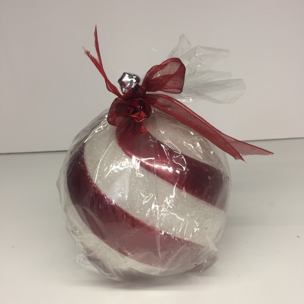 Red and white striped Christmas ball candle